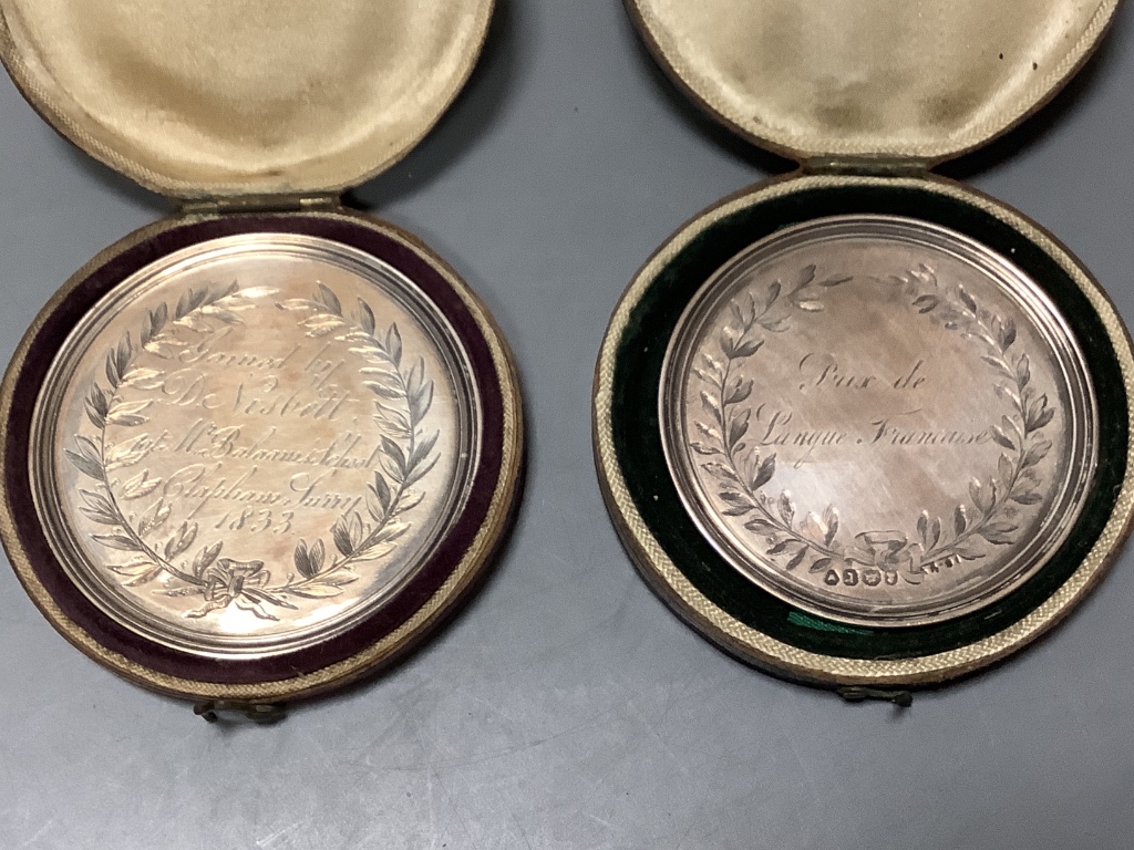 Two cased William IV silver medallions within graved inscriptions, maker JE Terry and Co, London 1832 and 1833, diameter 52 mm.